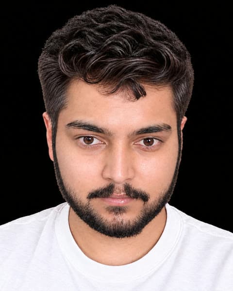 Deep’s reference picture: a young man with dark curly hair and a white T-shirt.