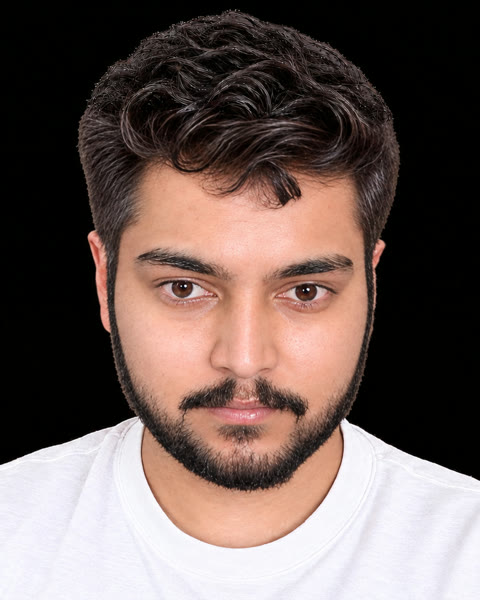 Deep’s reference picture: a young man with dark curly hair, a short beard and a white T-shirt, facing the camera.